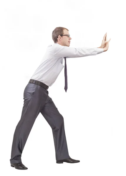 Businessman pushing invisible wall — Stock Photo, Image