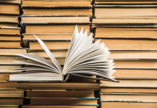 . Open book on stack of books. — Stock Photo, Image