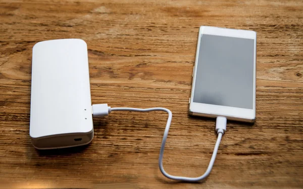 Phone charging with power bank — Stock Photo, Image