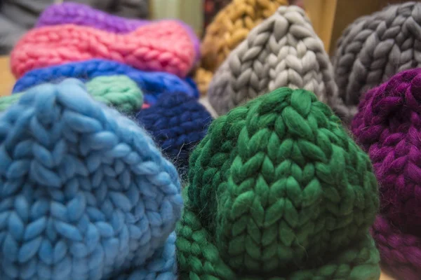 l background of knitting. Hats