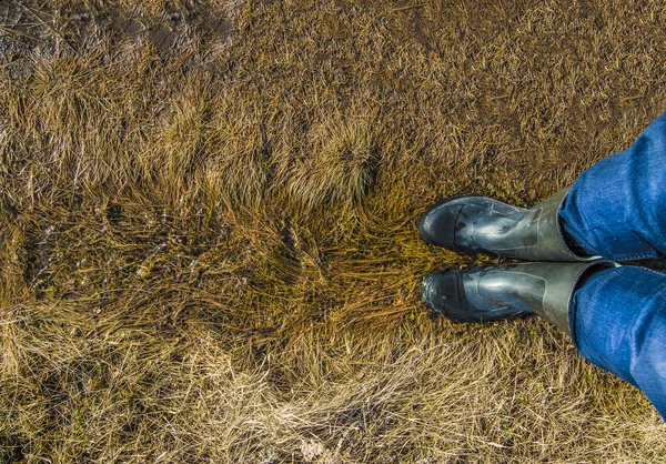 Osoba w buty gumowe — Zdjęcie stockowe