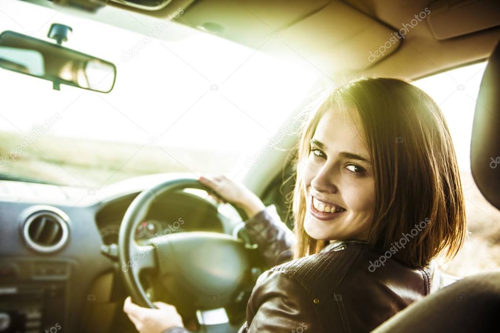 woman  holding  wheel