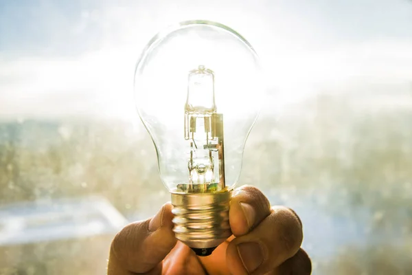 Hand holding Light Bulb — Stock Photo, Image