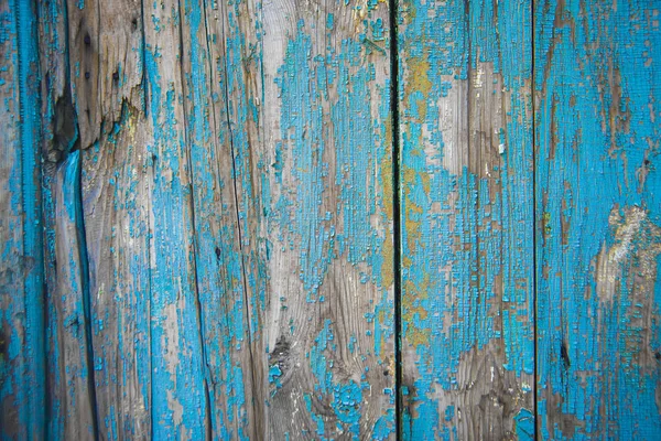 Oude geschilderde blauwe houten hek — Stockfoto