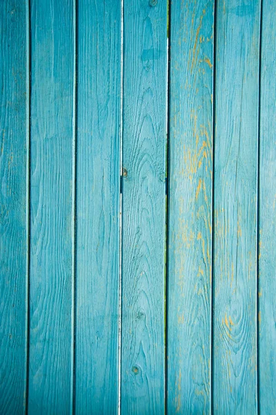 Oude geschilderde blauwe houten hek — Stockfoto