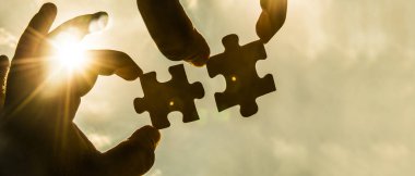 Puzzle parçaları ile el