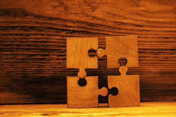 Wooden puzzle pieces — Stock Photo, Image