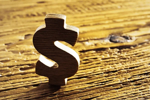 Signo de dólar de madera — Foto de Stock