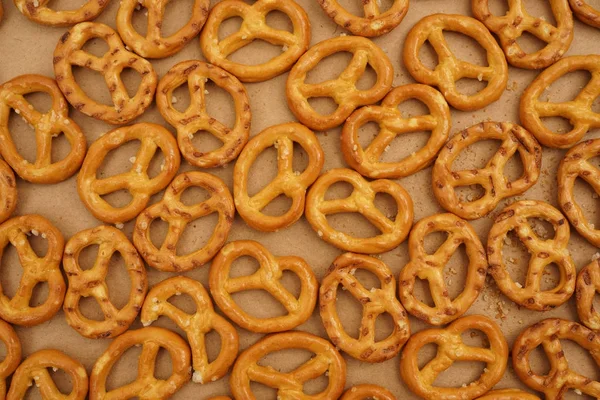 Pretzels Brown Craft Paper Spices Craft Paper Background — Stock Photo, Image