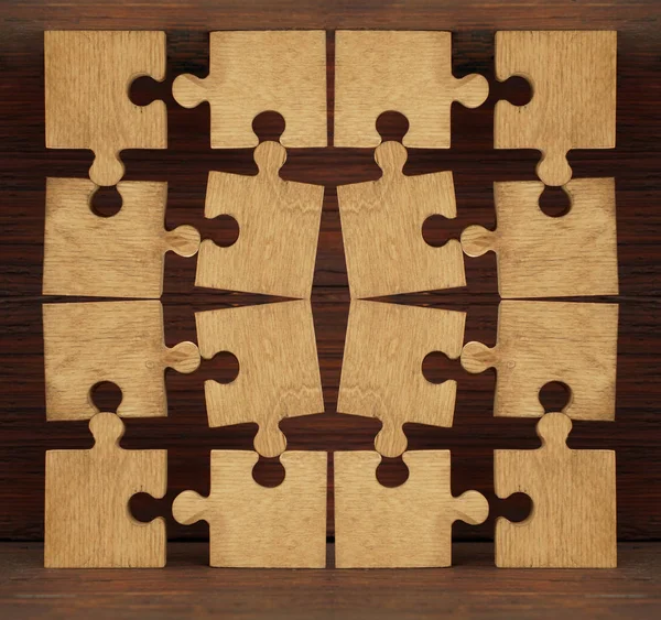 Peças de quebra-cabeça de madeira — Fotografia de Stock