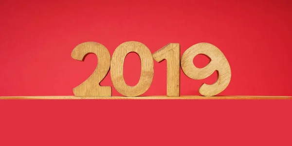 new Year card  2019. Big wooden year number