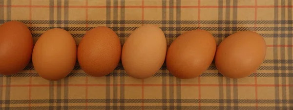 Ostertafel Draufsicht Auf Eier Auf Papier Frohe Osterfeiertage — Stockfoto
