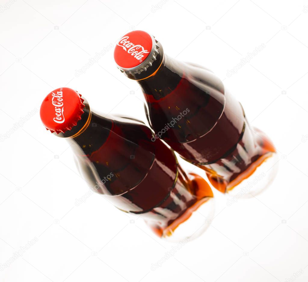 MOSCOW, RUSSIA -  FEBRUARY, 01, 2014:  Two coca cola bottles   isolated on white background.