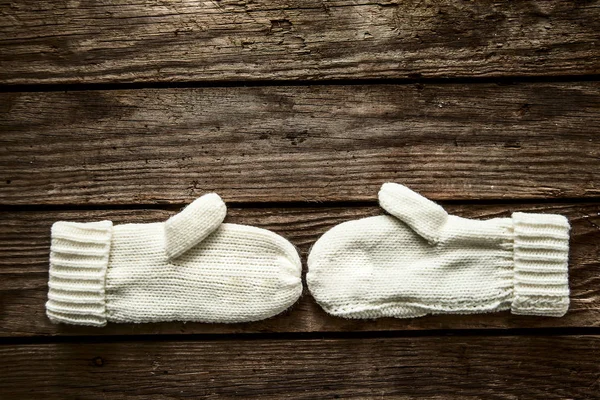 Two White Mittens Wooden Table Christmas Seasonal Background — Stock Photo, Image