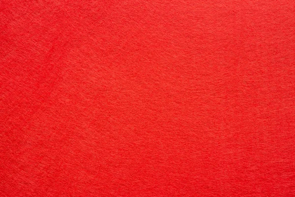 Rustic canvas fabric texture in red color. Red textile texture background