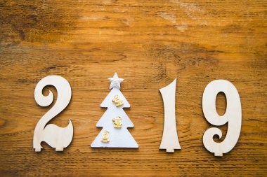 El ilanı, afiş veya davetler için gerçek ahşap arka plan ile 2019 happy New Year Mevsimlik arka plan