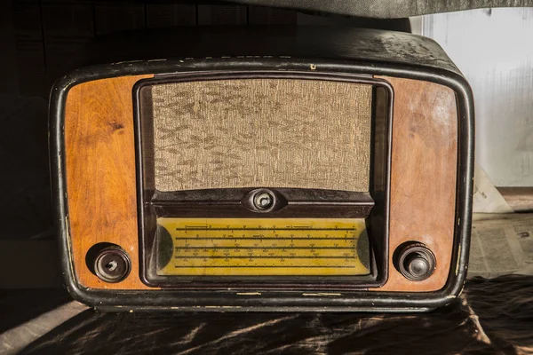 antique radio on vintage background. Antique radio on retro background