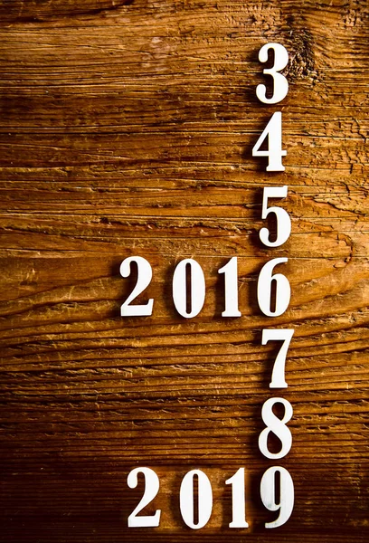 Six years  from 2013, 2014, 2015, 2016, 2017, 2018, 2019 on wooden table calendar background