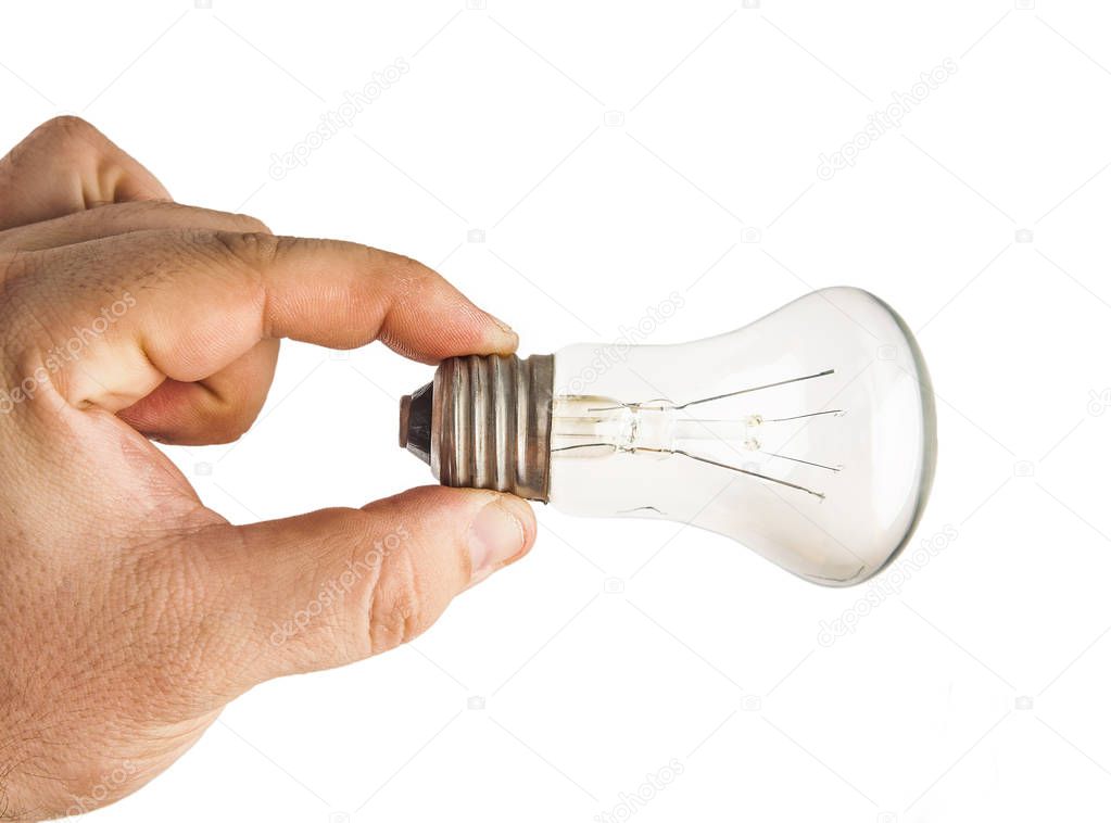 male Hand holding light bulb isolated on white background.
