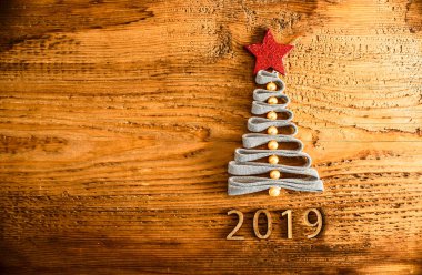 Dantel vintage tarzı ahşap doku Noel ağacından. mutlu yeni yıl kartı