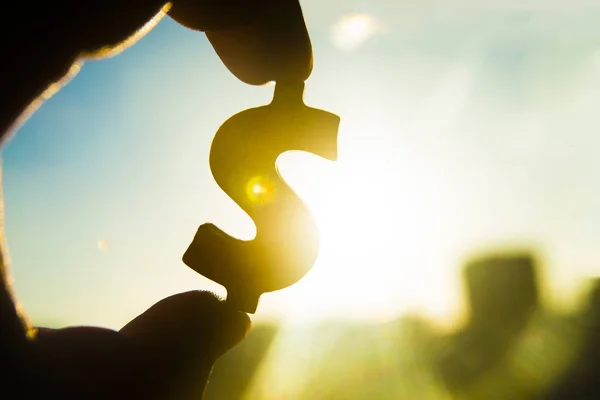 Hand Holds Silhouette Dollar Sign Sunset Sky Background — Stock Photo, Image