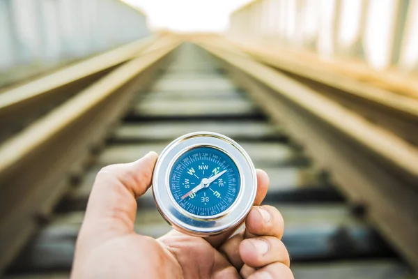 Travel Concept Man Hand Holds Metal Modern Compass Wooden Metal — Fotografia de Stock