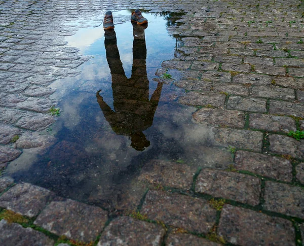 Reflection Man Standing Puddle Stock Picture