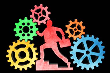 işadamı birçok dişli tekerlekleri, beyaz arka plan üzerinde izole cogwheels içinde çalışan durumda. 