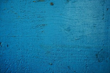 Lekeli, çizikli, mavi boyalı ahşap arkaplan deseni. 