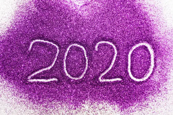 Card with text Happy 2020 New Year of purple glitter on white pa — Stock Photo, Image