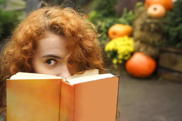 Beautiful Curly Redhead Student Girl Covering Her Face Orange Book — Stock Photo, Image