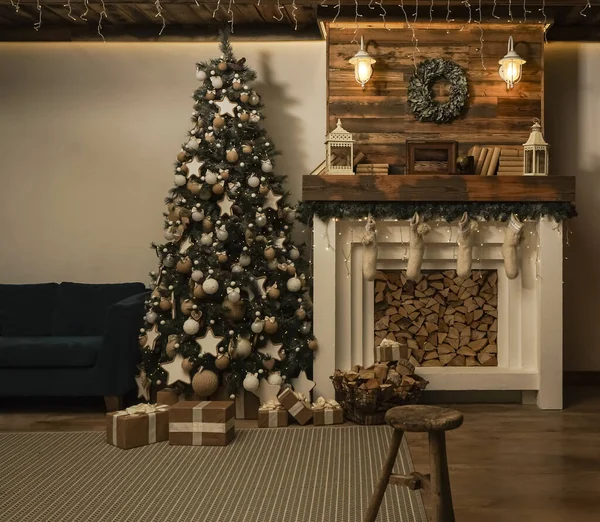 Design room with Christmas tree, sofa and the fireplace. Interior eco style. Christmas decorated interior of couch and Christmas tree, modern and cozy. happy new year and merry christmas