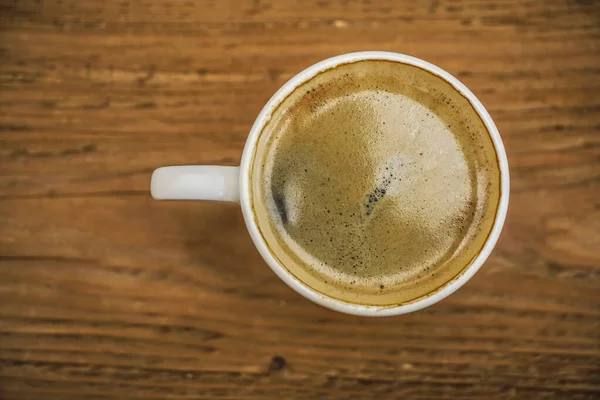 Tasse Schwarzen Natürlichen Kaffee Auf Holztischhintergrund Draufsicht Leerer Kopierraum Für — Stockfoto