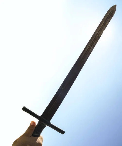 Historical Sword Male Hand Blue Sunny Sky Background Face Sun — ストック写真