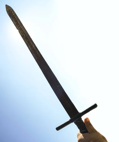 Historical Sword Male Hand Blue Sunny Sky Background Face Sun — ストック写真