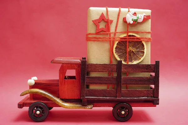 Wooden Toy Truck Christmas Gift Box Red Paper Background Copy — Stock Photo, Image