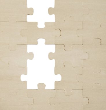 Kayıp tahta bulmacanın parçalarını yerleştiriyorum. İş konsepti. el yapımı kağıt arkaplanı. 
