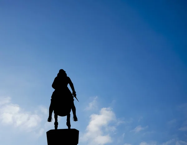 Silhouette Rider Horse Blue Sky Background Legs Stirrups Dagger Hand — Stock Photo, Image