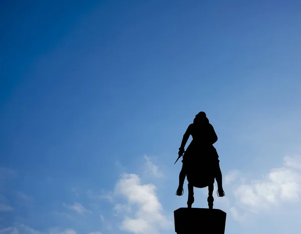 Silhouette Rider Horse Blue Sky Background Legs Stirrups Dagger Hand — Stock Photo, Image