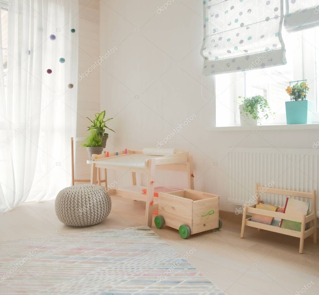 children's room and furniture and natural green flowers 