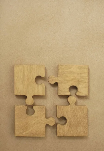 Vier Houten Puzzelstukjes Concept Van Verbindingspersonen — Stockfoto