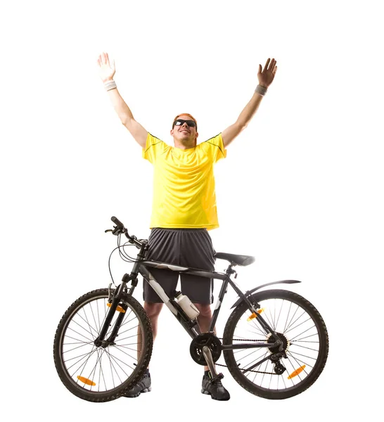 happy cheerful cyclist standing near bicycle isolated on white background. hands up. Successful cyclist on a road bike.  Winner bike racer.