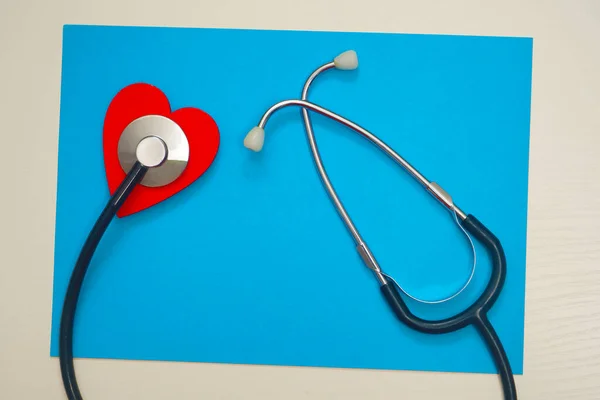 Red Heart Stethoscope Blue Paper Background Health Care Concept Health — Stock Photo, Image