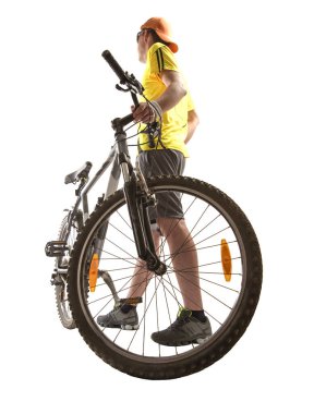 Beyaz arka planda duran bisikletli genç bir sporcu. Bmx bisikletçisi. Yürüyen bisiklet. beyaz arkaplanda izole. 