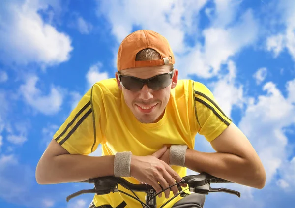 Portrait Young Man Riding Bicycle Yellow Shirt Blue Sky Background — Stock Photo, Image