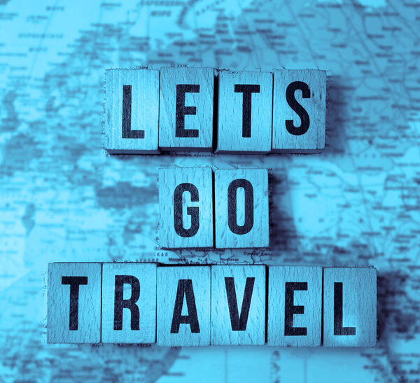 Lets go travel - travel adventure concept filtered image with blurred map