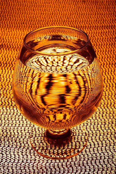 Cognac Glas Met Wodka Pure Alcohol Een Geruite Ondergrond Het — Stockfoto