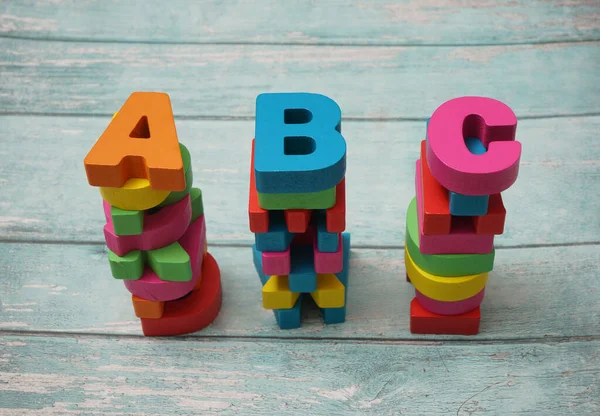 Photo Wooden Alphabet Blocks Spelling Abc Wooden Cubes Letter Isolated Stock Picture