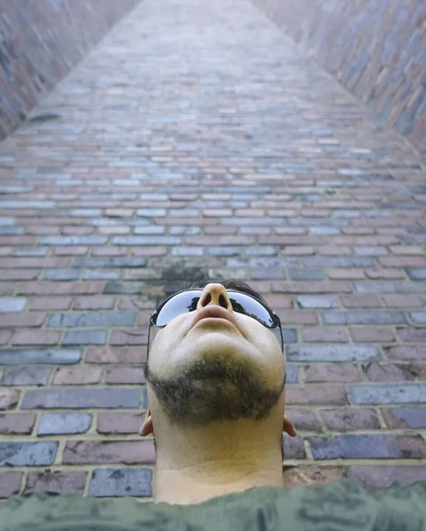 Handsome Young Unshaven Man Stands Brick Walls Summer Day Bearded — Stock Photo, Image