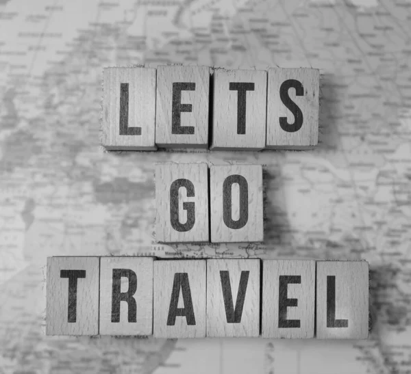 lets go travel - travel adventure concept filtered image with blurred map